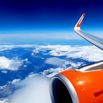 Official easyJet media-library file photograph of an aircraft engine and wing in flight. It is not evidence of installed Starlink equipment or service availability.