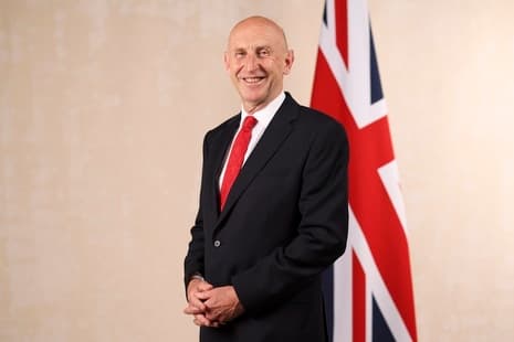 Official GOV.UK file portrait of Chancellor John Healey, whose October24 announcement sets out AI Security Institute, National Cyber Shield and NERV funding. It is not an image of a new operational centre.