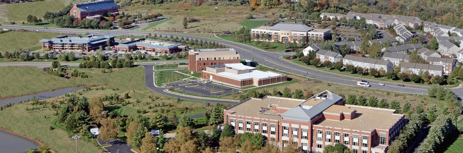 George Washington University’s archival aerial photograph of its Virginia Science and Technology Campus in Ashburn, the actual site covered by the preliminary AWS–Loudoun agreement; this is not a photograph of a new data center.